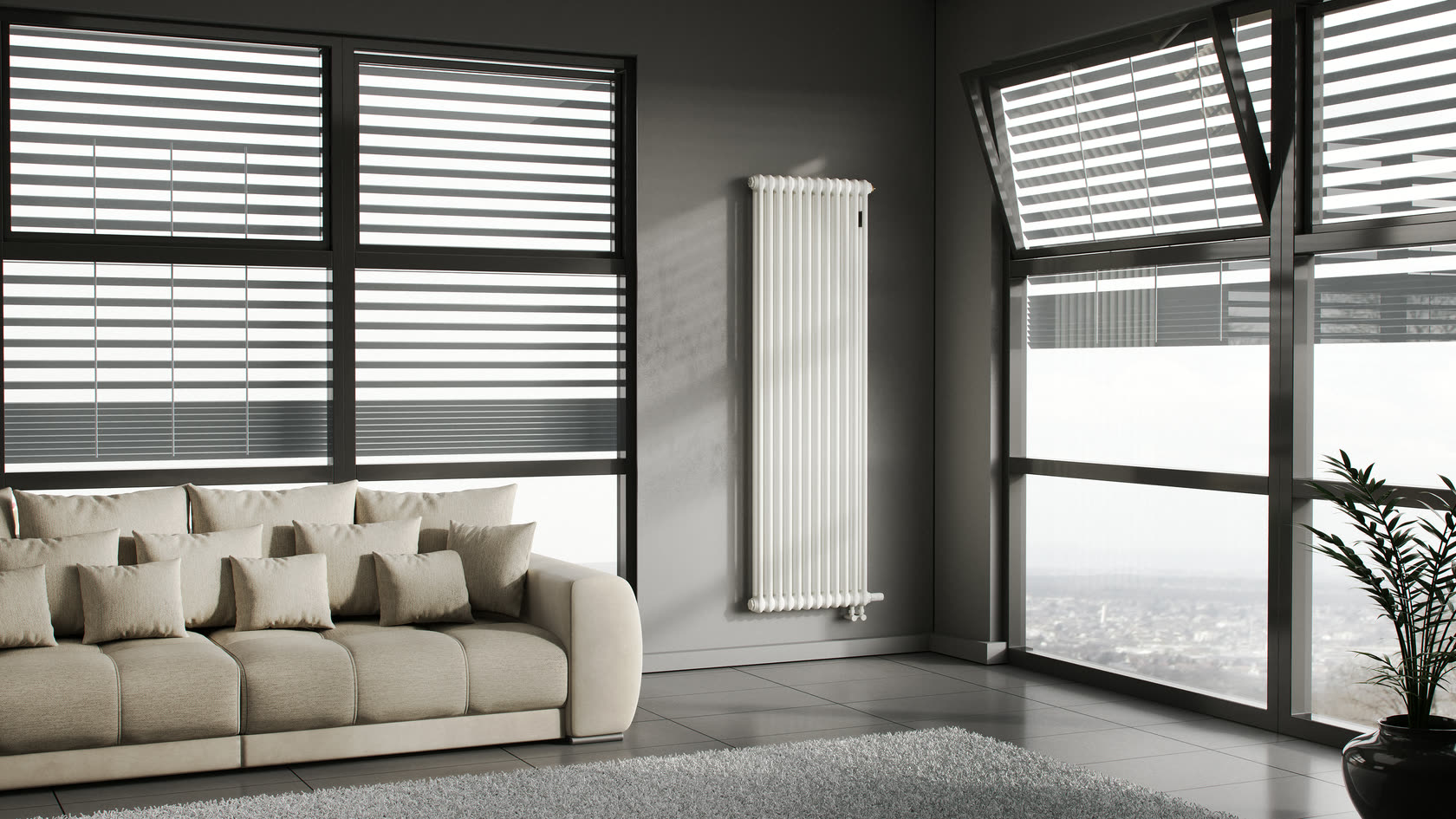 KERMI RRV2180 tubular radiator in a living room interior — vertical, between windows