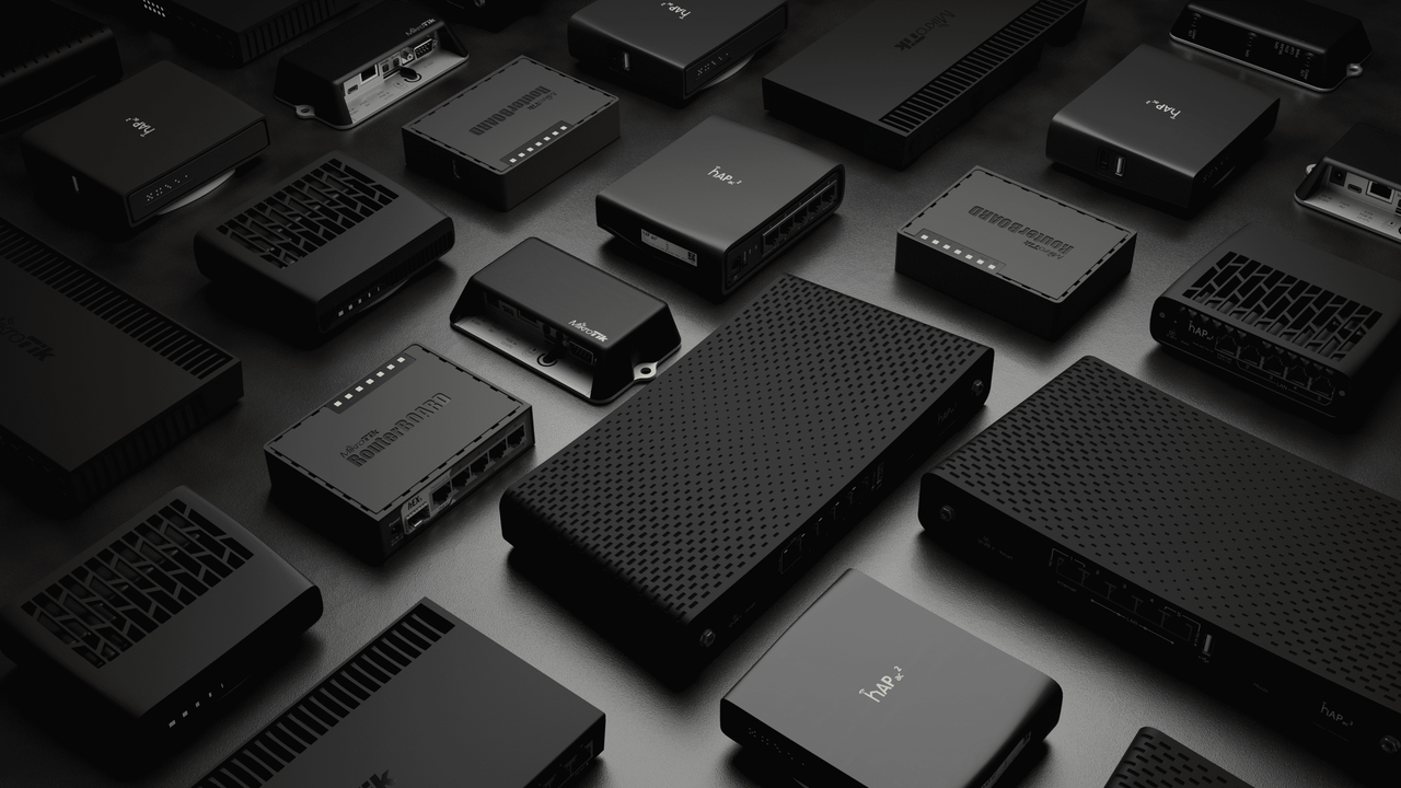 A collection of networking hardware models on a dark background